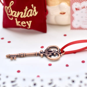 Copper Santa key on a white plate