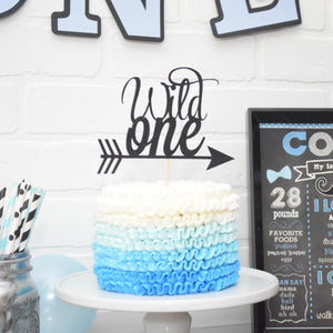 Black wild one cake topper on blue ombre cake