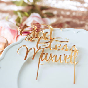 gold acrylic cake topper on a white plate for baptism or confirmation
