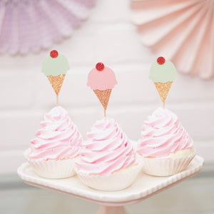 Ice cream cupcake toppers on pink cupcakes
