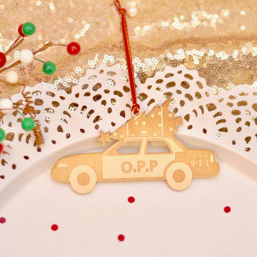 O.P.P. cruiser car with Christmas tree on top of it for OPP Christmas gift