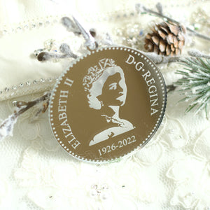 Silver Queen Elizabeth II Christmas tree ornament that has the years 1926-2022 for a memorial ornament
