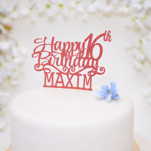 Red happy 16th birthday Cake topper on a white cake with blue flowers