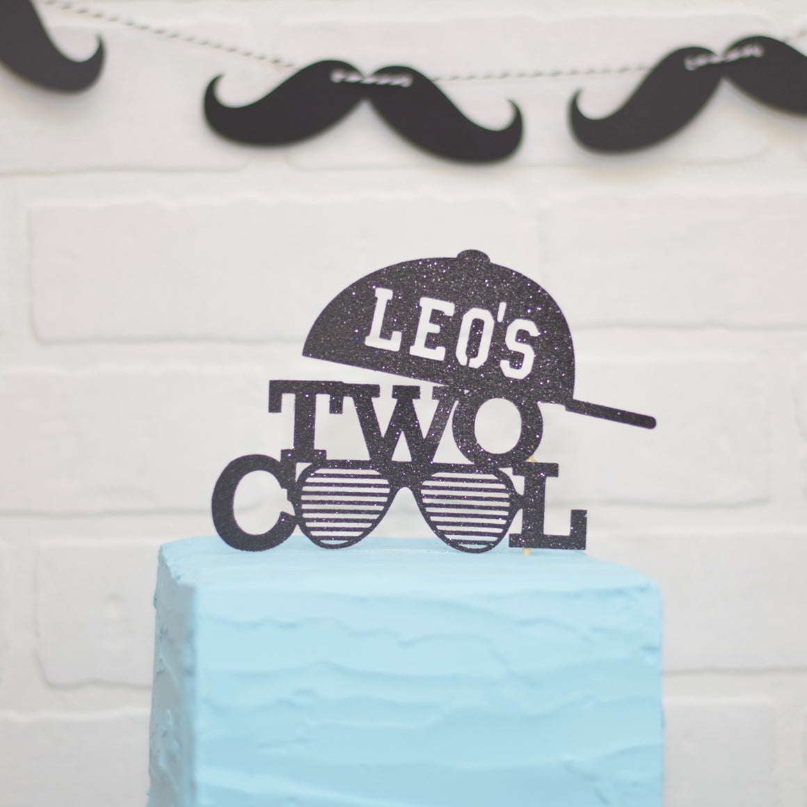 Leo's Two Cool Cake Topper with sunglasses and a hat. Second birthday cake topper