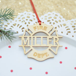 fire department ornament on a white cake plate
