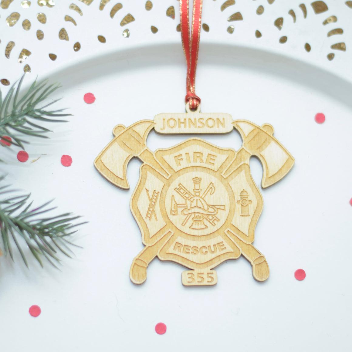 fire fighter ornament on a cake plate