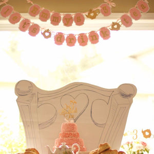 Emmy's 3 lets drink tea pink and gold sparkle banner above tea party decorations