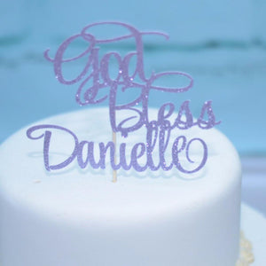 God Bless Danielle lavender glitter cake topper on white wedding cake