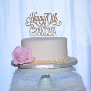Happy 70th Grandma birthday cake topper on ivory cake with pink flower