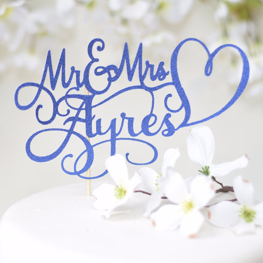 Mr and Mrs Malloy heart wedding cake topper with gold sparkle details