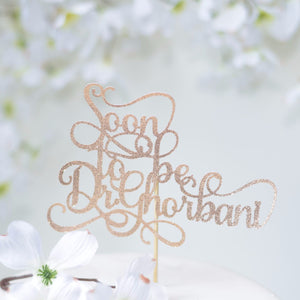 Soon to be Dr Ghorbani gold sparkle cake topper