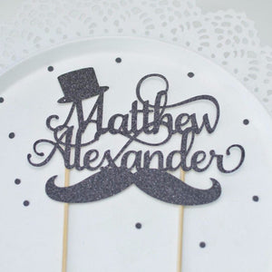 Black little gentleman cake topper with mustache and top hat details