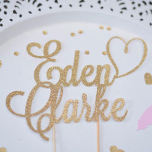 Eden Clarke cake topper with heart detail and gold glittery sparkles