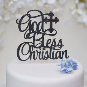 God bless Christian black sparkle glitter cake topper on white cake with blue flower