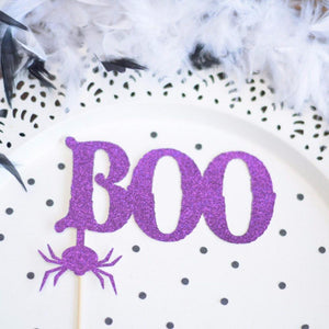 Purple Boo purple glitter cake topper with spider accent on white plate