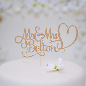 Mrs and Mrs Bolton gold sparkle heart cake topper