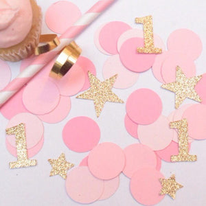 gold sparkley stars and number 1 confetti with pink circles