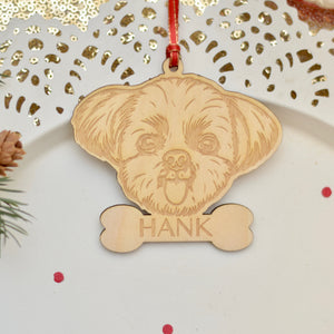 Personalized shih tzu ornament on a cake plate with red confetti