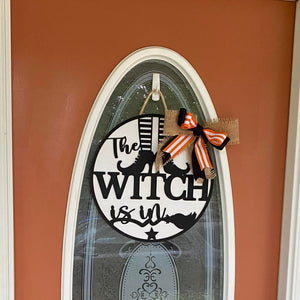 Halloween Front door sign The witch is in with a big burlap, black and orange bow.